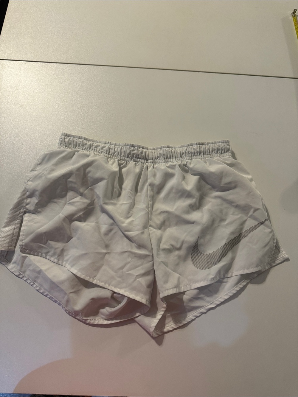 Nike White Women’s Athletic Shorts with Silver Swoosh